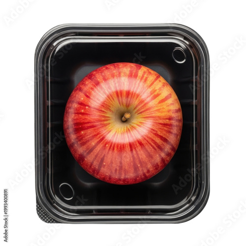 Single Red Apple Packaged in a Black Plastic Container with Clear Lid, Top View Isolated on White - Concept of Food Waste and Plastic Pollution
