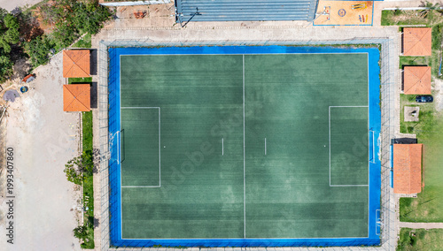 Slika na platnu Aerial view of a sports field in the Fercal working-class town, dependent from mines at Cafuringa Environmental Protection Area