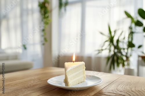 Celebration Cake With a Candle on a Table in a Bright Room During Daytime