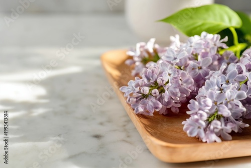 Fresh Lilac Flowers Displayed on a Wooden Tray on a Marble Surface With Soft ...