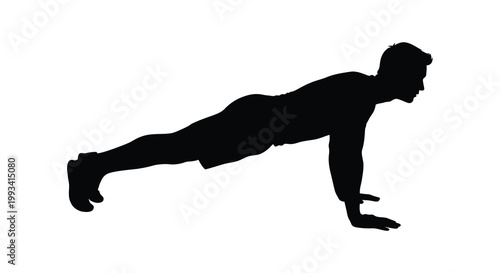 Man performing a push up exercise in stark black silhouette