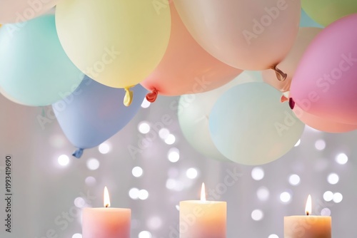 Colorful Balloons and White Candles Create a Festive Scene for a Celebration