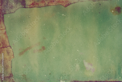 Aged Green Textured Surface with Rust  