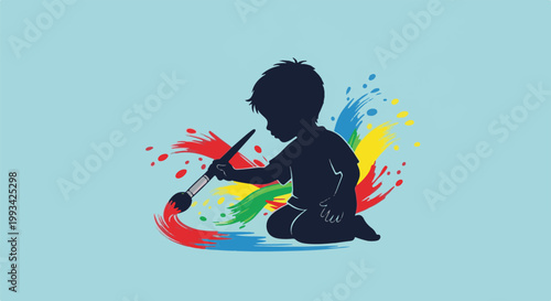 Silhouette of a child painting with colorful splashes