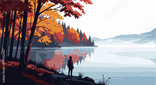 Silhouette gazes at serene lake reflecting autumnal forest and distant misty mountains