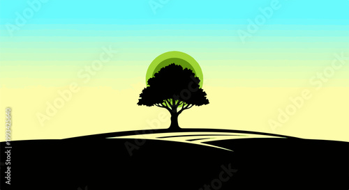 Silhouette of a solitary tree against a gradient sky and sun