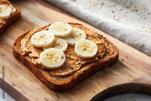 Sliced Bread Topped With Peanut Butter and Banana in a Kitchen Setting