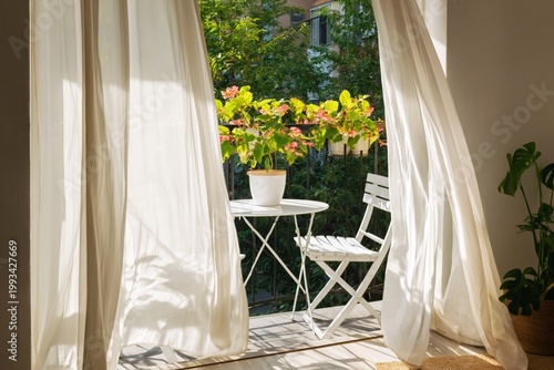 Cozy Indoor Space With Plants and a Table by the Window Overlooking Nature