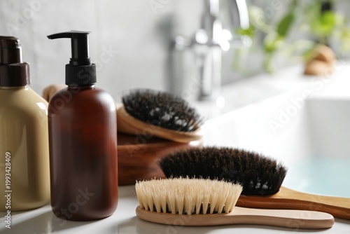 Spa Setup in a Bathroom With Bottles, Brushes, and Natural Light
