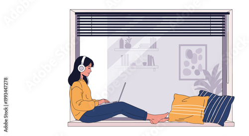 Young girl with headphones working on laptop while sitting on windowsill in cozy room with cushions and plants.