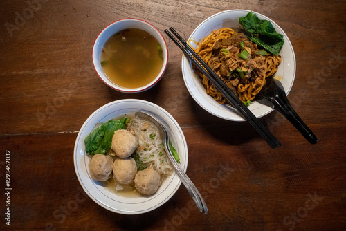 Indonesian street food, Mie Ayam and Bakso, noodles with meat balls and chicken meats
