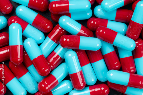 red and blue hard gelatin capsules for background.