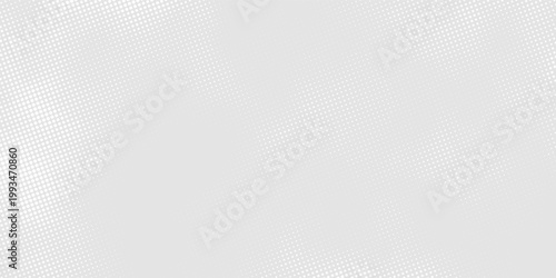 A smooth light gray surface enhanced by a gentle grid of fine white halftone dots.