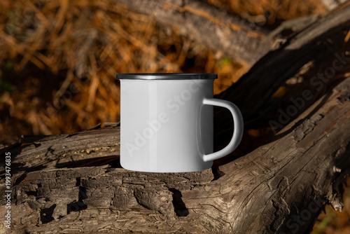 Template of enameled white mug with iron rim, for hot drink, design, branding on nature background, outdoors.