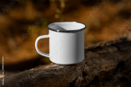 Template of enameled white mug with iron rim, handle, cup for coffee, for design, branding, on a background of nature, outdoors.