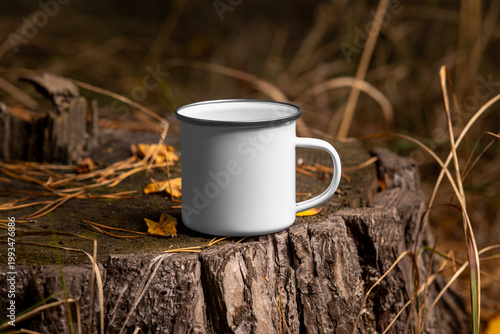 Mockup of enameled white mug with iron rim, metal dishware for hot drink, for design, print, branding.