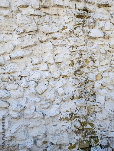 White textured stone wall