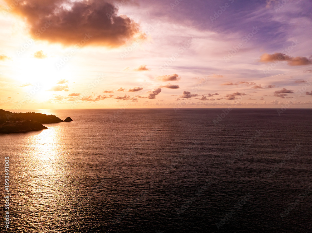 Fototapeta premium Beautiful Light Sunset or sunrise over sea,Aerial view scenery Sky with Amazing clouds and waves in sunset sky nature light cloud background