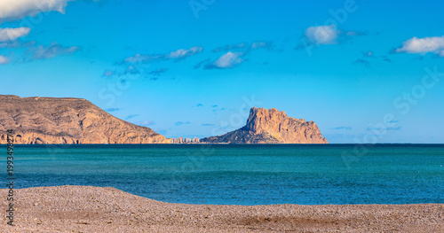 Panoramic view of Playa de Altea beach at the Mediterranean sea Costa Blanca shoreline with seafront Morro de Toix and Ilfach cliffs of Altea in Spain