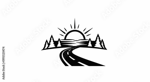 Scenic road leading to a sunrise over water surrounded by trees