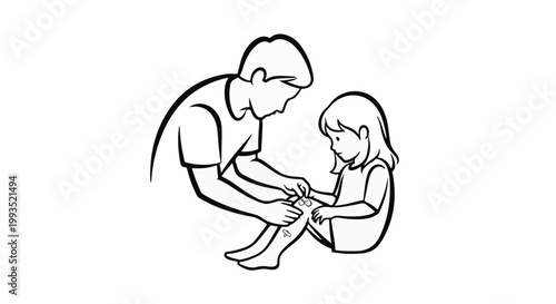 Parent bandaging child's scraped knee with care and compassion