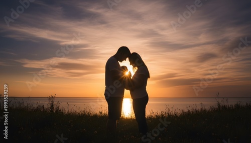 Silhouetted Couple Embracing at Sunset by Water