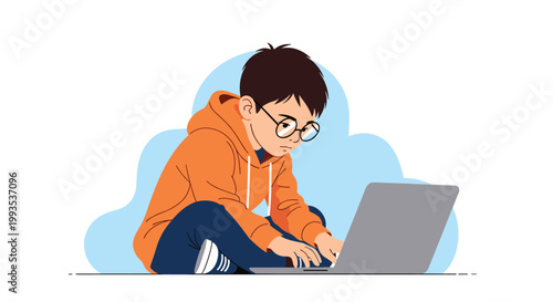 Focused young boy wearing glasses and an orange hoodie sitting cross-legged on the floor while working intently on a laptop computer.