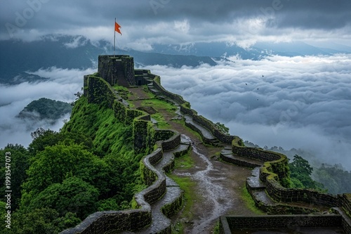 Cloud inversion during monsoon at Pratapgad fort - UNESCO World Heritage Site, Mahabaleshwar, Maharashtra	