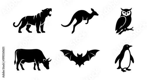 Minimalist animal silhouettes set, black wildlife icons collection of 6 vector elements, tiger kangaroo owl cow bat and penguin graphics for logo design