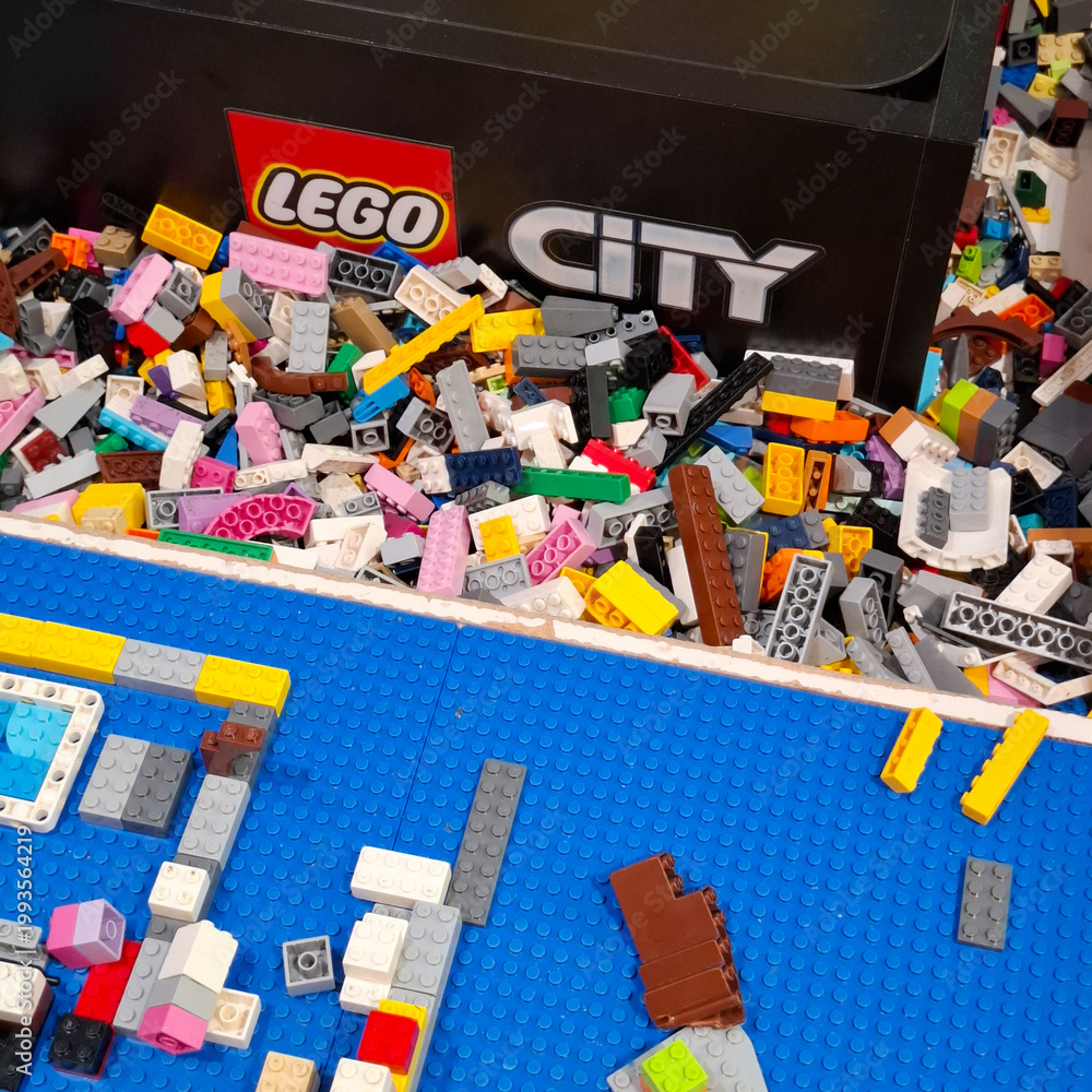 Fototapeta premium Assorted Plastic Building Blocks and Bricks with Lego City Brand Logo for Creative Construction Play and Educational STEM Activity on April 14, 2026 in Bangkok, Thailand