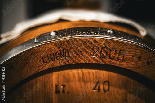 Tableau sur toile Traditional balsamic vinegar aging in wooden barrels in Italy, Modena, Emilia Ro