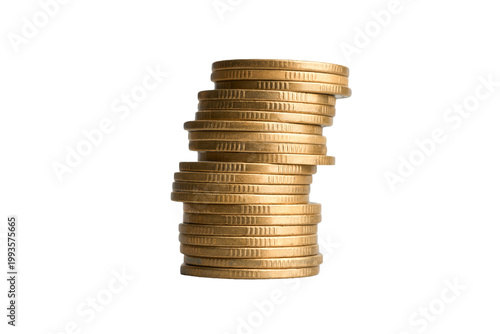 Fotografie High stack of gold coins on black background representing financial risk and ins