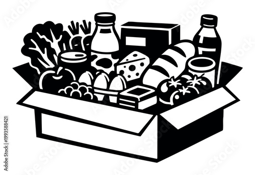 Groceries and various essential food items filling a cardboard box, representing donation, charity, and hunger relief efforts