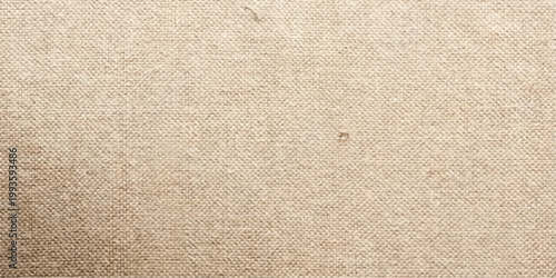 Abstract seamless beige canvas textile with subtle texture, evoking a sense of classic simplicity and understated elegance. it’s a perfect visual for design. for art, banner, web, ui, branding
