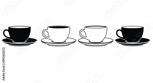 Four coffee cups in black and white on saucers, isolated