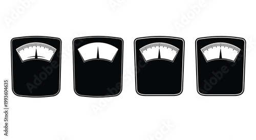 Black and white of four empty bathroom weight scales