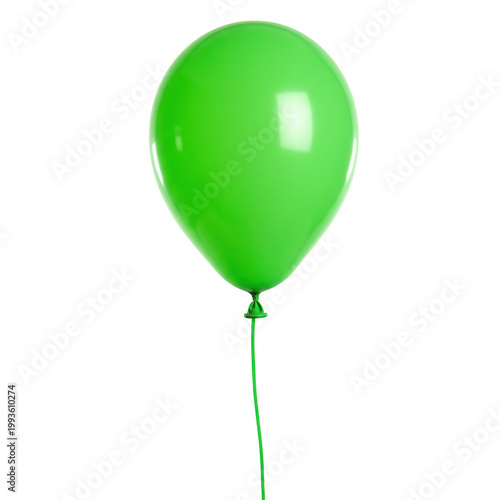 Single green balloon on black background a vibrant image for celebrations