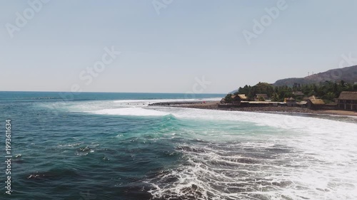 Aerial low shot of the coastline in central media. This video was filmed in El Zonte