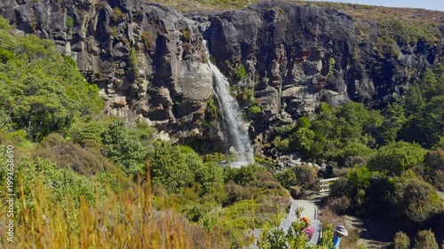 Taranaki Falls cascading into a boulder-edged pool in Tongariro National Park