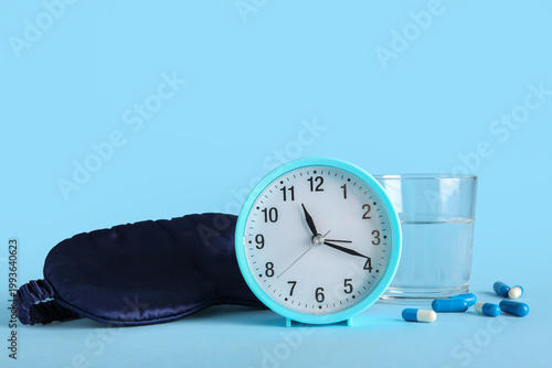 Melatonin pills, alarm cloc...