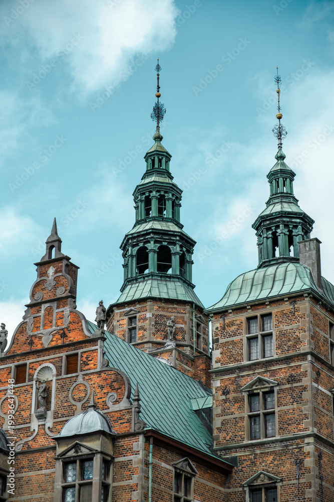 Obraz premium Steeples of Rosenborg Slot Castle in Copenhagen, Denmark