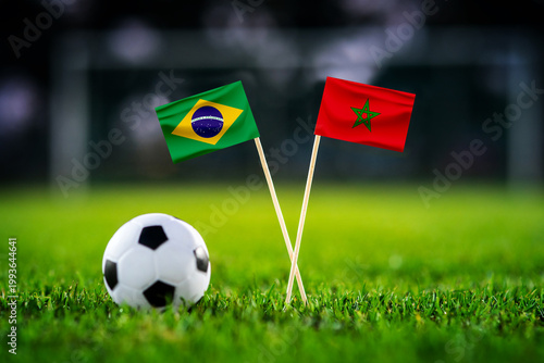 Brazil vs Morocco, national flags before world championship Group C group stage match, football on green pitch with goal in the background, East Rutherford, USA, June 13, 2026