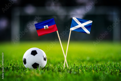 Haiti vs Scotland, national flags before world championship Group C group stage match, football on green pitch with goal in the background, Foxborough, USA, June 13, 2026