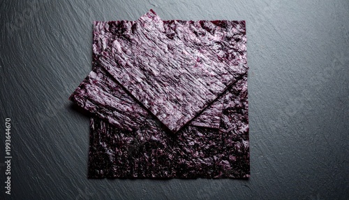 Vibrant Red Seaweed Sheets for Culinary or Artistic Use