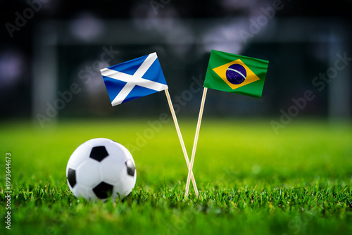 Scotland vs Brazil, national flags before world championship Group C group stage match, football on green pitch with goal in the background, Miami Gardens, USA, June 24, 2026