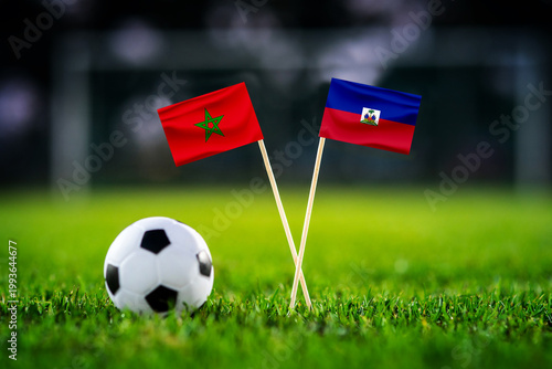 Morocco vs Haiti, national flags before world championship Group C group stage match, football on green pitch with goal in the background, Atlanta, USA, June 24, 2026