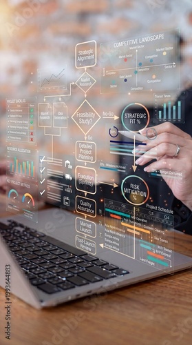 A person analyzing data on a laptop with a futuristic interface