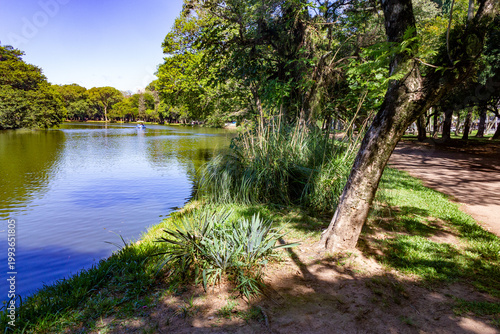 Lake and lush trees at Redencao Park in Porto Alegre, Brazil