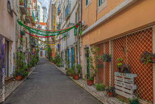 LISBON, PORTUGAL - APRIL 7, 2024: Hidden in Madragoa, between the neighborhoods of Santos and Santa Catarina, Rua da Silva, better known as Rua Verde, is a green street in Lisbon. 