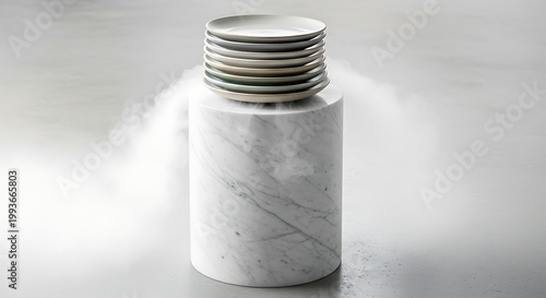 Elegant Stack of White Plates on a Marble Cylinder Display.